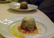 Lo spinoso Sardo in timballo gratinato di mezzemaniche con pecorino di Fossa.