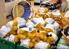 Oltre alle patate viola, l'azienda produce anche patate, cipolle e legumi.